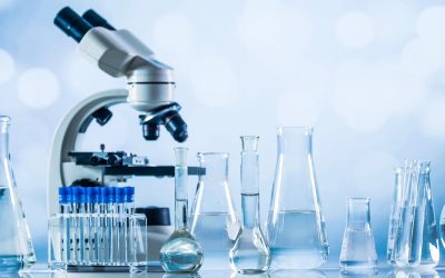 Science laboratory research and development concept. microscope with test tubes